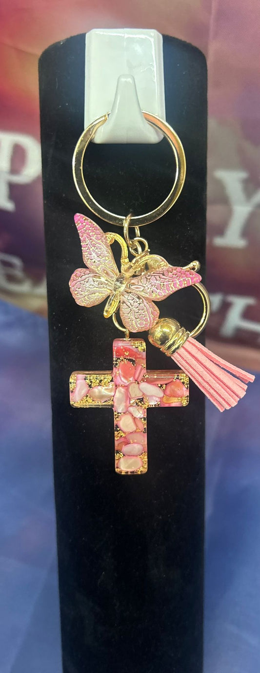 Heaven’s Whisper Luxe Sleutelhanger met Roze Vlinder en Marmerlook Kruis van Onlyheknows2025, een elegant accessoire dat geloof en bescherming symboliseert. Met een verfijnd ontwerp, een luxe afwerking en een combinatie van een roze vlinder en een marmerlook kruis, staat deze sleutelhanger voor transformatie en spirituele waarden. Perfect als cadeau of voor persoonlijk gebruik.